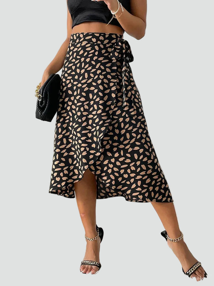 Carla | Jupe Portefeuille Midi Évasée Taille Nouée Femme